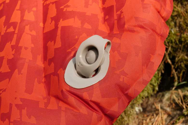The Vaude Performance 7 has a valve that you can leave open when draining.