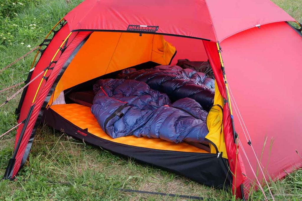 Three sleeping pads of approx. 51 cm will fit in the inner tent. But it is cosy.