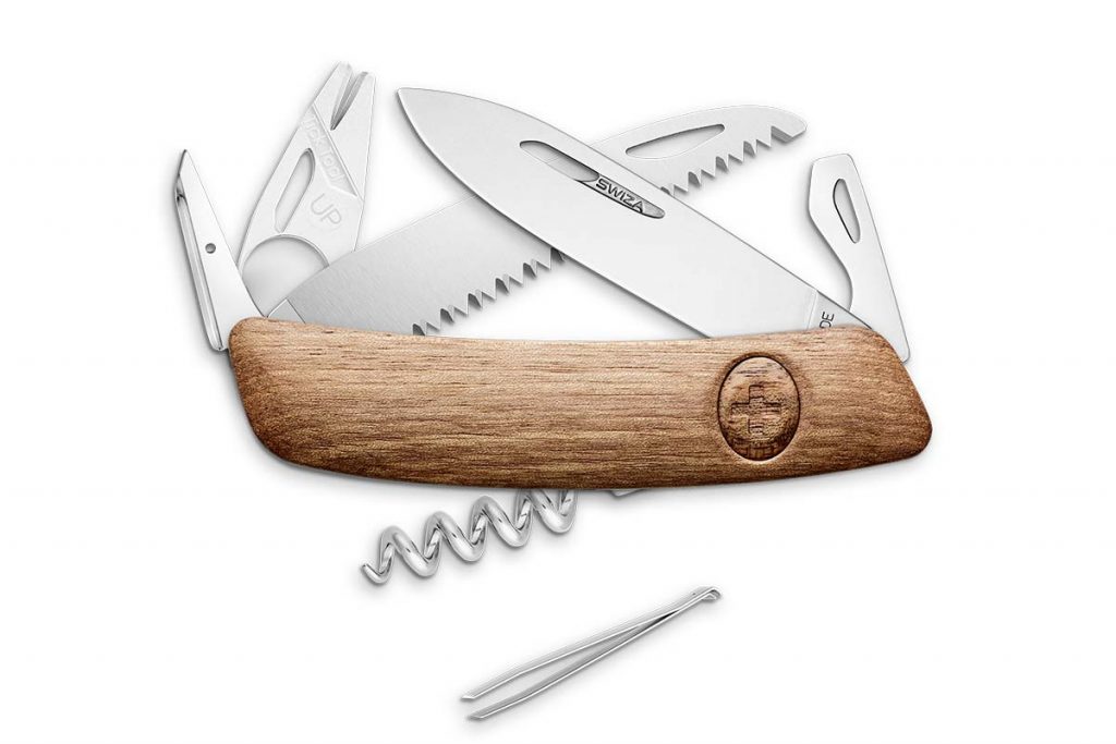 The Swiza TT03 Tick Tool in walnut wood open.