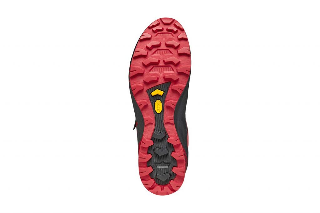 The shoe is equipped with a Vibram Megagrip outsole.