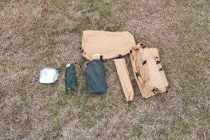 Stuff-bag, instructions, pole, pegs, repair kit, floor and tent.
