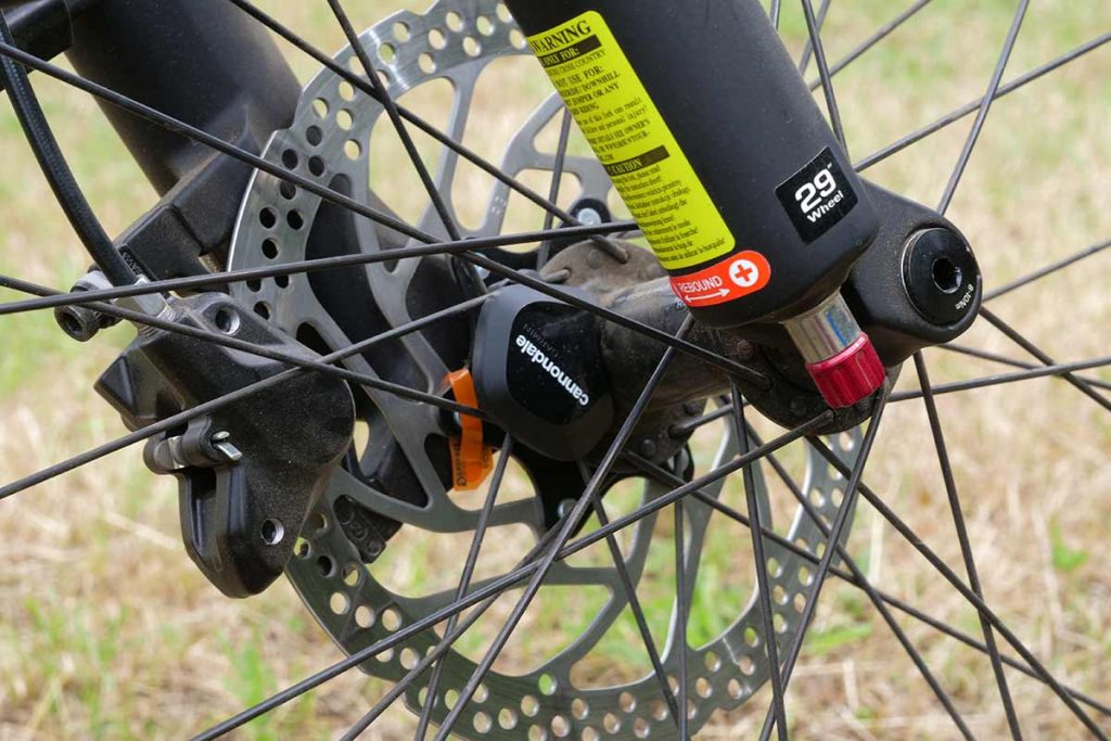 The rebound button is positioned on the bottom of the left fork leg.