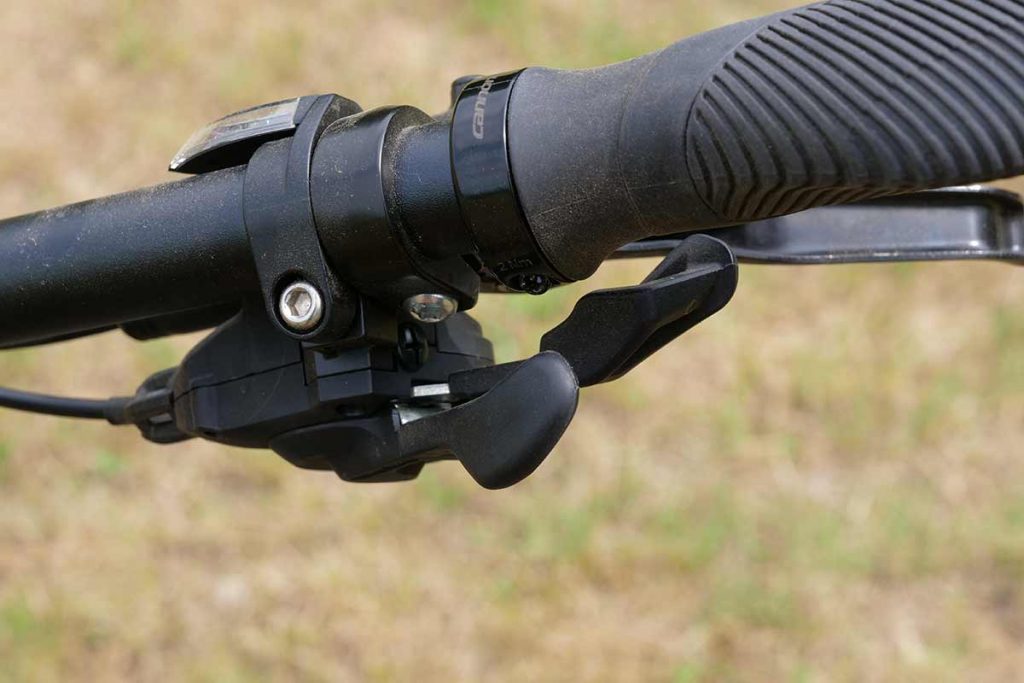 The Shimano Deore shifter on the left side of the handlebar is precise.