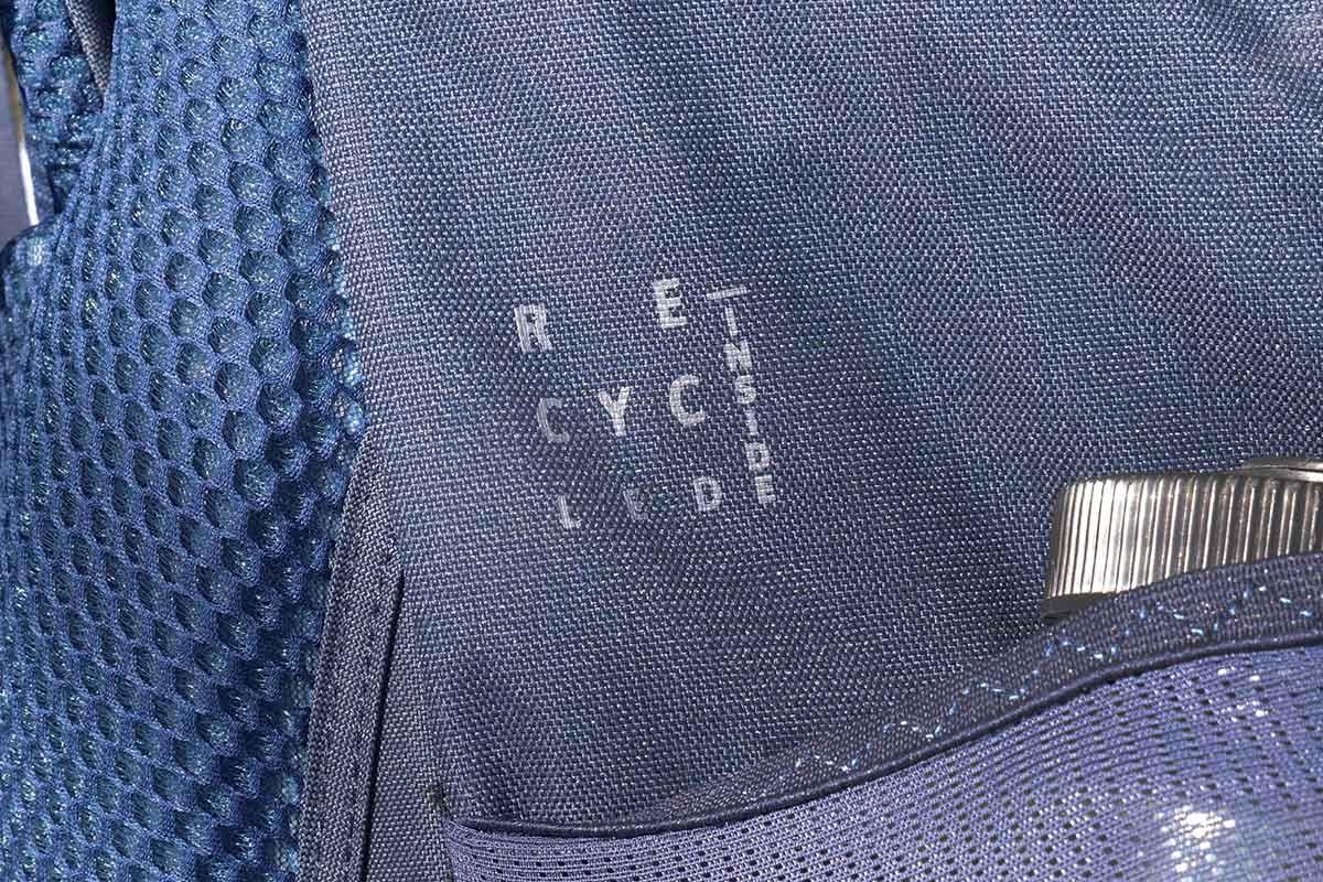 The main fabric is a polyester yarn that is made from recycled PET bottles.