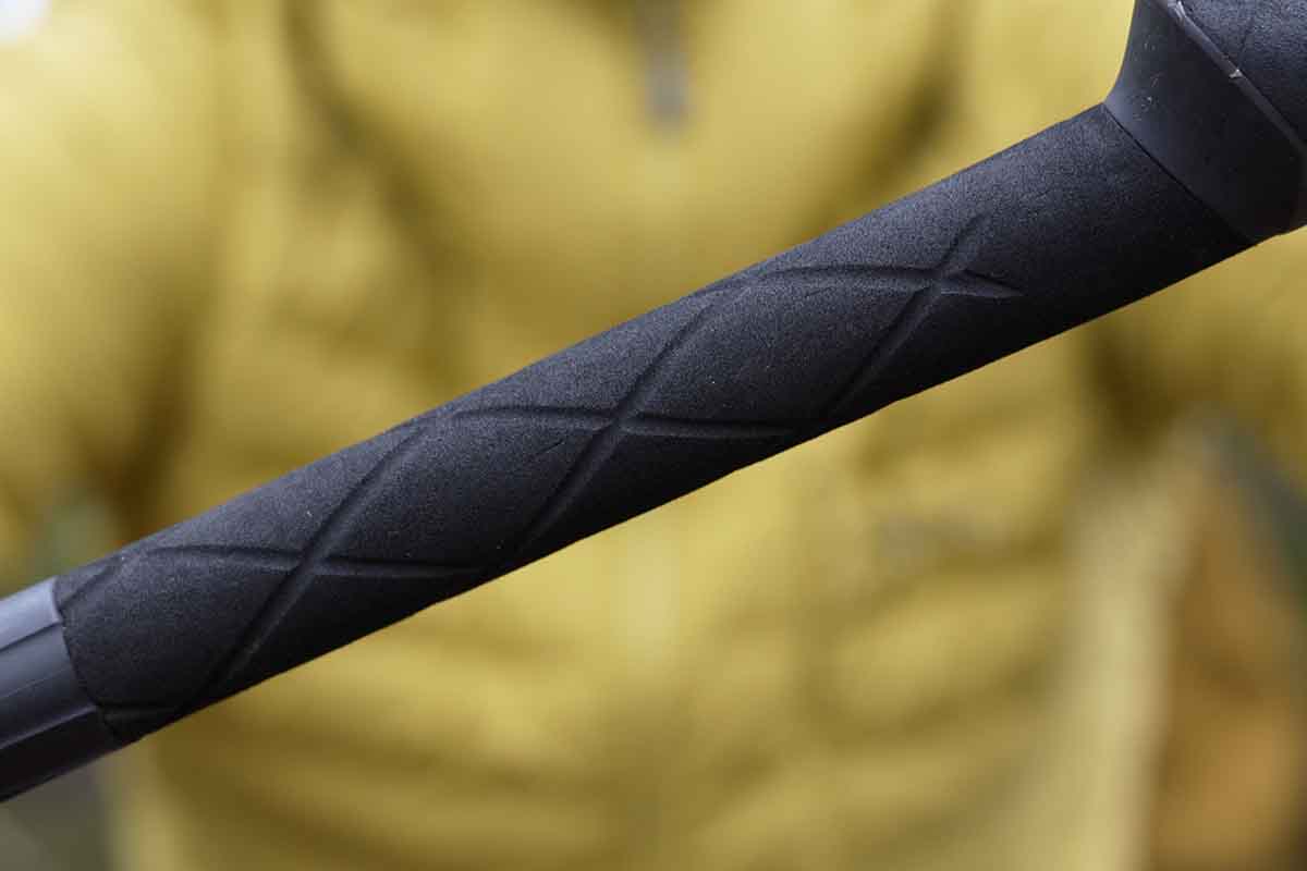 The grip is made from a rubbery foam material and the bottom part is about 15 cm long.