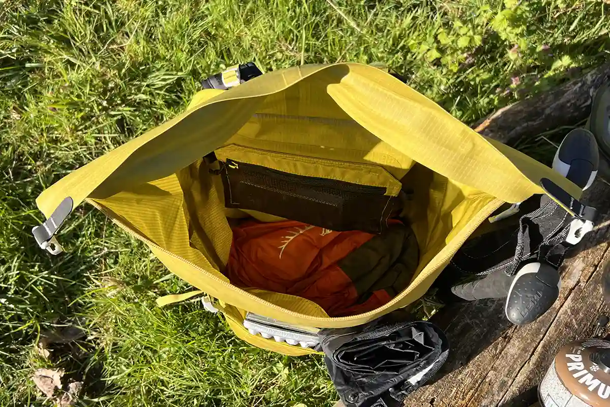 Getting gear in and out the main compartment is a hassle because of the sticky coating on the inside.